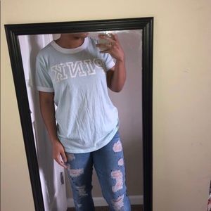 Light blue and white “pink” t-Shirt